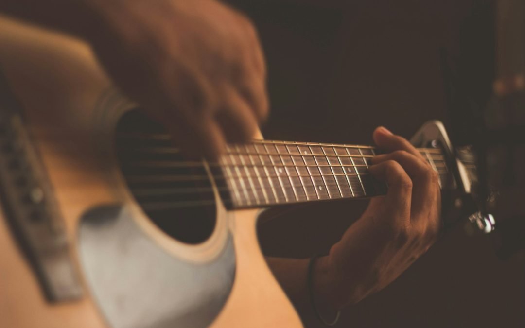 person playing guitar